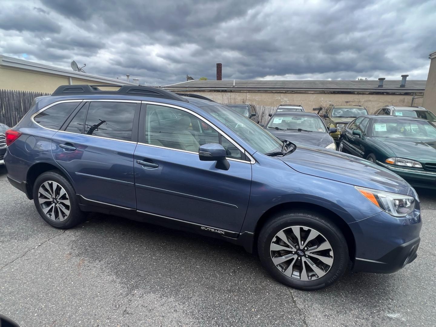 2017 Blue /beige Subaru Outback 2.5i Limited (4S4BSANC6H3) with an 2.5L H4 DOHC 16V engine, CVT transmission, located at 1018 Brunswick Ave, Trenton, NJ, 08638, (609) 989-0900, 40.240086, -74.748085 - Photo#5